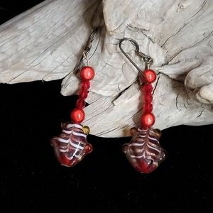 Red glass fish motif dangle earrings